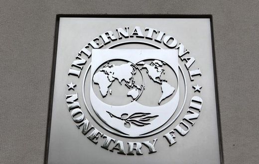 The International Monetary Fund (IMF) logo is seen at the IMF headquarters building during the 2013 Spring Meeting of the International Monetary Fund and World Bank in Washington, April 18, 2013. REUTERS/Yuri Gripas