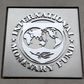 The International Monetary Fund (IMF) logo is seen at the IMF headquarters building during the 2013 Spring Meeting of the International Monetary Fund and World Bank in Washington, April 18, 2013. REUTERS/Yuri Gripas