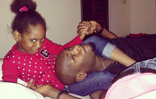 2face and his daughter, Isabella.