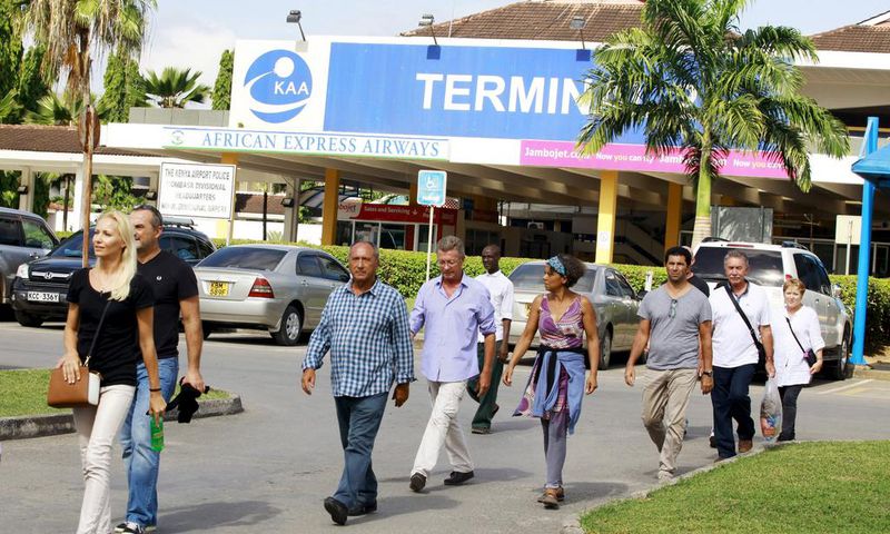 Passengers who were onboard an Air France Boeing 777 aircraft that made an emergency landing are escorted from Moi International Airport in Kenya's coastal city of Mombasa, December 20, 2015.