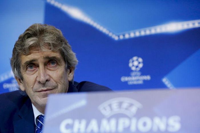 Manchester City's manager Manuel Pellegrini listens to a journalist during a news conference ahead of their Champions League soccer match against Sevilla at Ramon Sanchez Pizjuan stadium in Seville, southern Spain, November 2, 2015. REUTERS/Marcelo del...