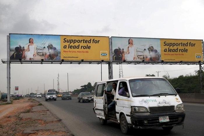 A billboard advertising MTN telecommunication company is seen along a road in Lagos November 16, 2015. (REUTERS/Akintunde Akinleye)