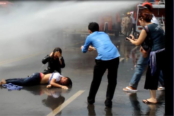 Cambodia police use water cannon to break up textiles strike