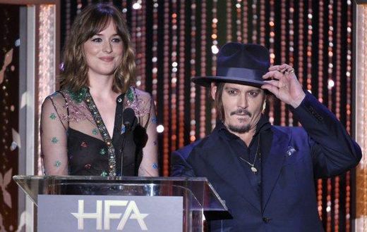 Dakota Johnson and Johnny Depp at the Hollywood Film Awards