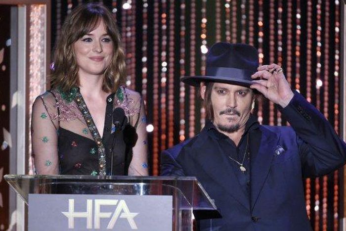 Dakota Johnson and Johnny Depp at the Hollywood Film Awards