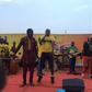 Ofori Amponsah performing at Alomo Aankwan Activation