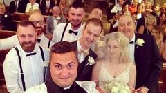 Vicar Paul Frost interrupted the ceremony of bride Emma Scarborough and groom Jamie to take the photograph using a selfie stick and is believed to be the first vicar to perform the stunt