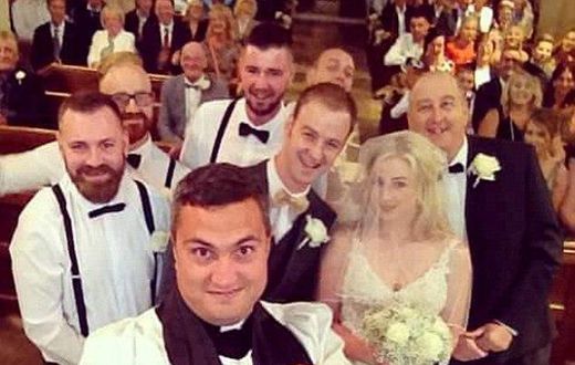 Vicar Paul Frost interrupted the ceremony of bride Emma Scarborough and groom Jamie to take the photograph using a selfie stick and is believed to be the first vicar to perform the stunt