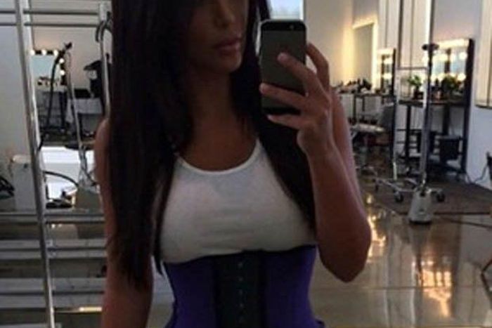 Kim Kardashian rocking waist trainer after pregnancy