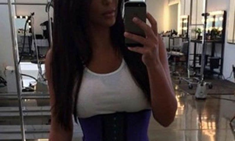 Kim Kardashian rocking waist trainer after pregnancy