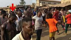 Pastor beaten to death in front of his church after being caught eating bread and faeces