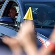 Pope Francis waves to pilgrims from his car, as he leaves the nunciature in Panama City and heads to Las Garzas youth detention center in Pacora, on the outskirts of the capital