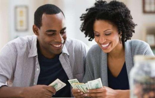 a couple counting money
