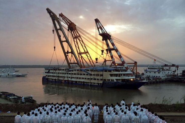 China puts ship disaster survivors at 12, says all 442 bodies found