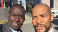 Hlomla Dandala, Chris Attoh on set of "Happiness is a Four Letter Word".