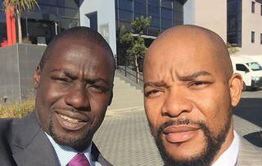 Hlomla Dandala, Chris Attoh on set of "Happiness is a Four Letter Word".