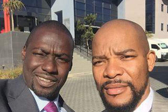 Hlomla Dandala, Chris Attoh on set of "Happiness is a Four Letter Word".