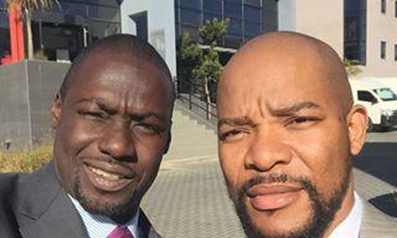 Hlomla Dandala, Chris Attoh on set of "Happiness is a Four Letter Word".