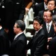 Japan PM Shinzo Abe (C) vowed to meet North Korean leader Kim Jong Un and restore diplomatic ties with Pyongyang