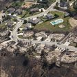 Residents return to see homes destroyed by Washington state fire