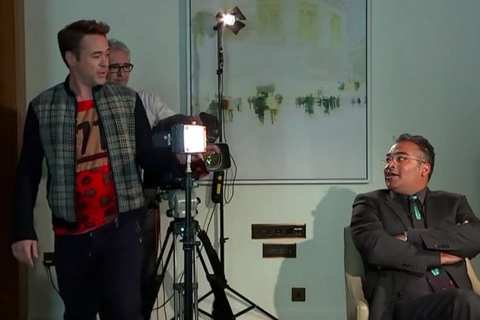 Robert Downey Jr. walking out on a speechless Krishnan Guru-Murthy and his camera man