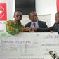 Diamond Platnumz getting his cheque of S14million
