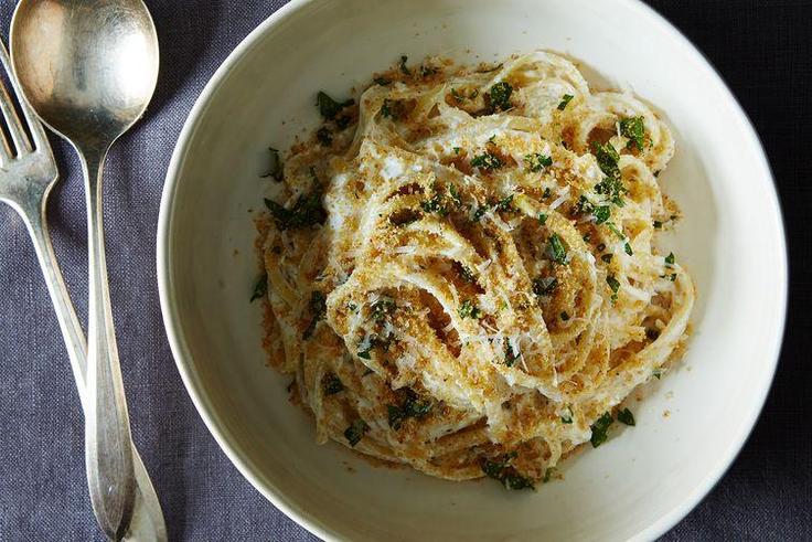 white pasta with garlic, cheese, bread crumbs