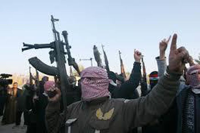 Militant group fighters battle Kurds in Syrian town