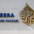The logo of Qatar-based Al Jazeera satellite news channel is seen in Doha February 7, 2011. REUTERS/ Fadi Al-Assaad