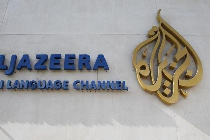 The logo of Qatar-based Al Jazeera satellite news channel is seen in Doha February 7, 2011. REUTERS/ Fadi Al-Assaad