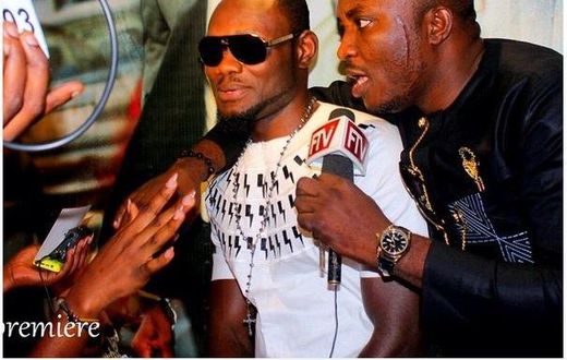 Prince David Osei in white shirt