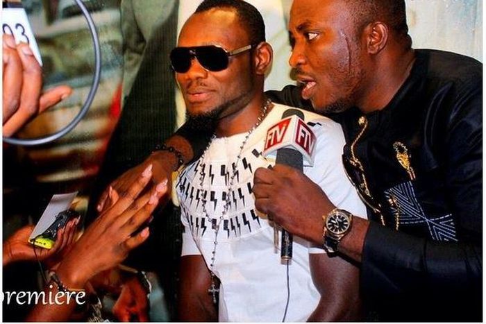 Prince David Osei in white shirt