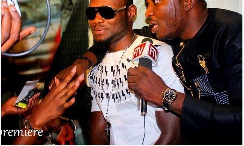 Prince David Osei in white shirt