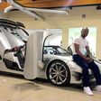 Floyd Mayweather posing with his Koenigsegg CCXR Trevita supercar.