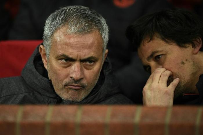 Jose Mourinho (L) talks with his assistant manager Rui Faria when the pair were at Man Utd
