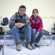 Ovidio Lopez Tum, 53, an asylum seeker from Guatemala, poses for a portrait with his daughter, Ingrid Maribel, 12, inside the church hall of the Basilica of San Albino in Mesilla, New Mexico