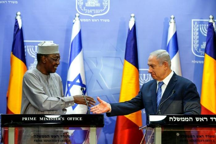 Israeli Prime Minister Benjamin Netanyahu (R) shakes hands with Chadian President Idriss Deby Itno at a joint statements in Jerusalem November 25, 2018