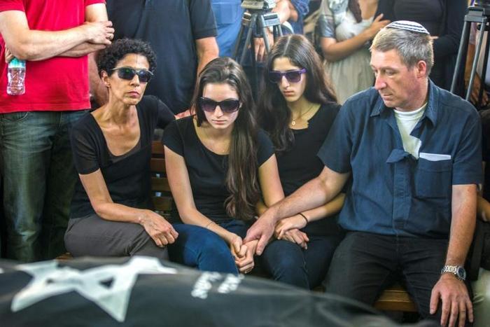 Shira (C-L) and Ayelet (C-R) Riva will face their parent's accused killer for the first time when they attend his trial in Brussels