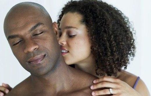 Black couple kissing