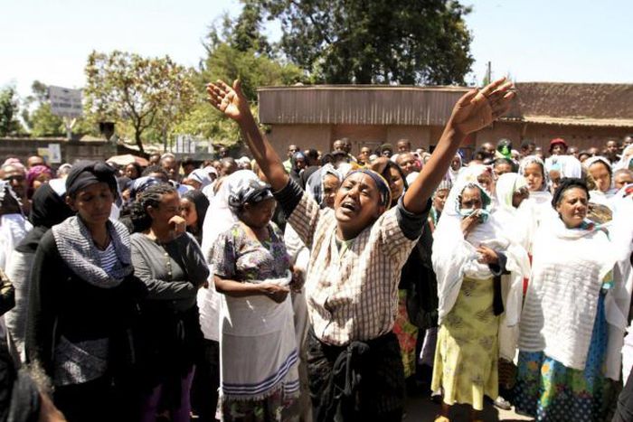 A woman cries at a gathering of the 30 Ethiopian victims killed by members of the militant Islamic State in Libya in the capital Addis Ababa April 21 2015.