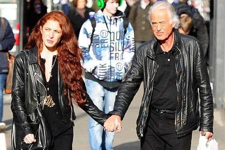 Jimmy Page and gilfriend walk hand-in-hand in London