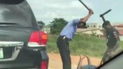 Nigerian police brutalizing 'stubborn' driver