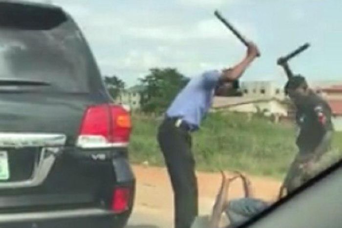 Nigerian police brutalizing 'stubborn' driver