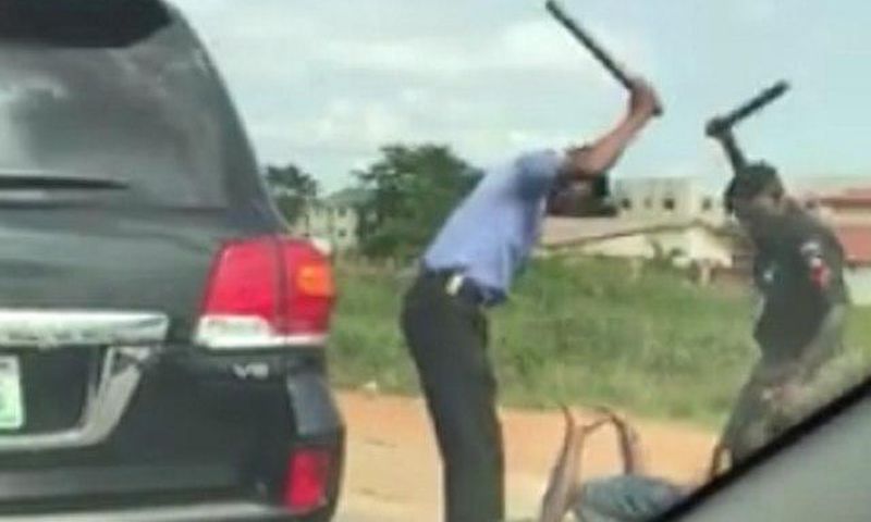 Nigerian police brutalizing 'stubborn' driver