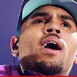 Chris Brown begs Obama to rescue him from Manila