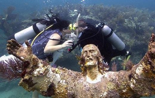 Kimberly Triolet and Jorge Rodriguez got married Tuesday beside the "Christ of the Deep" statue in the Florida Keys