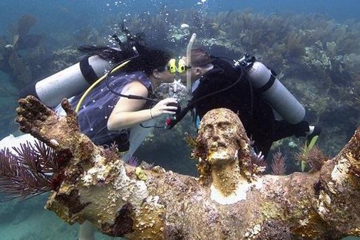 Kimberly Triolet and Jorge Rodriguez got married Tuesday beside the "Christ of the Deep" statue in the Florida Keys