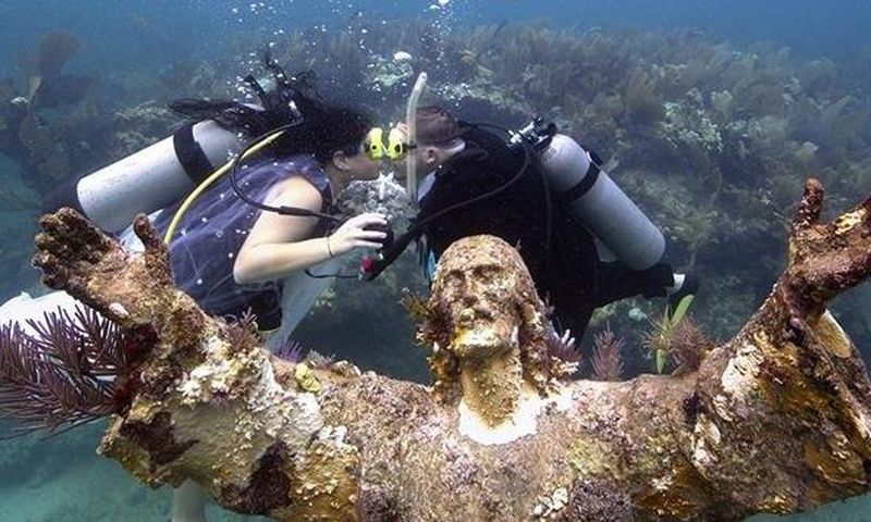 Kimberly Triolet and Jorge Rodriguez got married Tuesday beside the "Christ of the Deep" statue in the Florida Keys