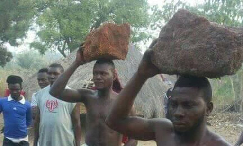 Instant justice: Thieves paraded with rocks on their heads as residents whip them
