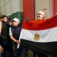 Egyptian representatives celebrate in Dakar after the Confederation of African Football (CAF) executive committee's decision to choose Egypt to host the 2019 Africa Cup of Nations